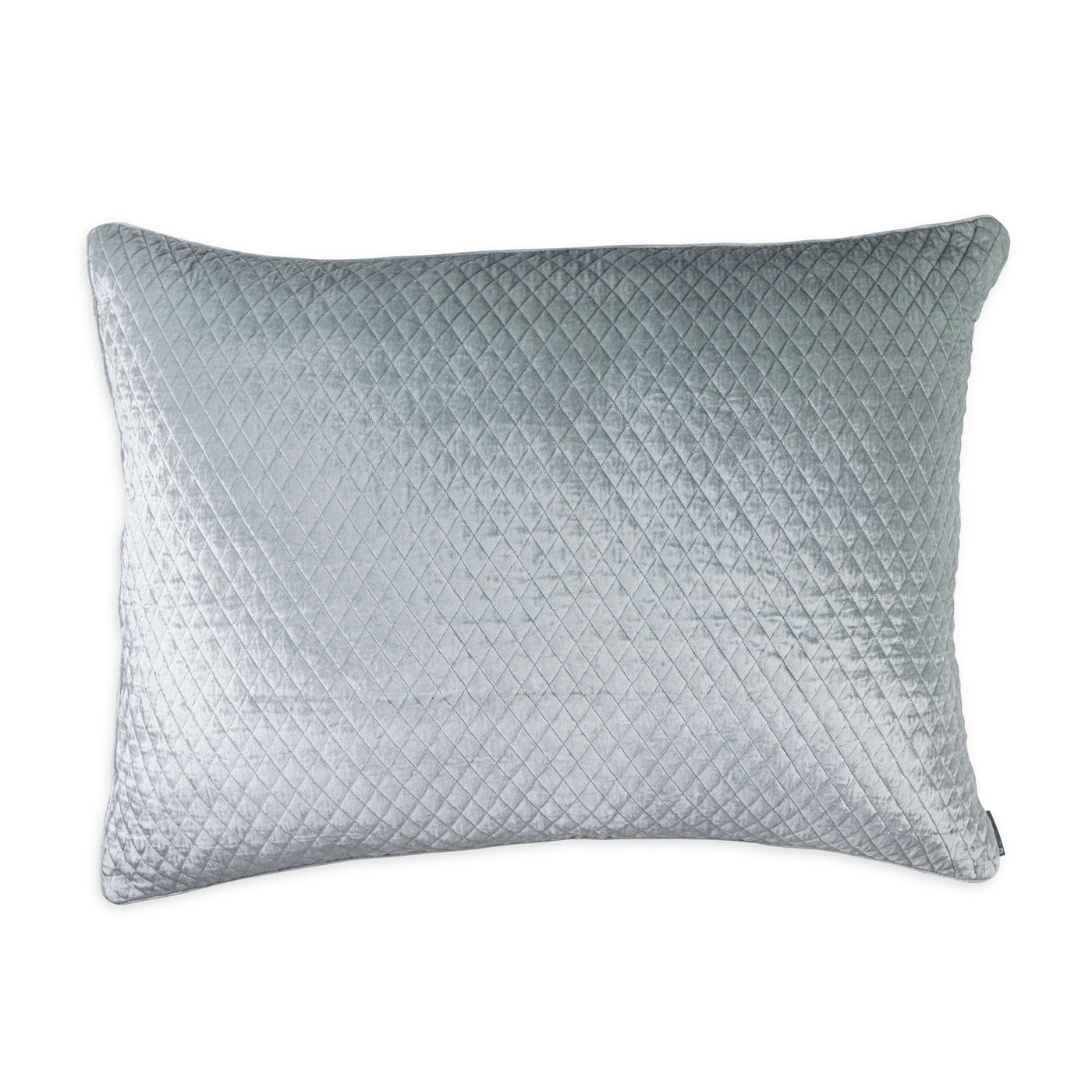 A quilted seaglass silk velvet standard pillow with a 1-inch diamond pattern and self-welt edge.