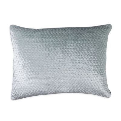 A quilted seaglass silk velvet standard pillow with a 1-inch diamond pattern and self-welt edge.